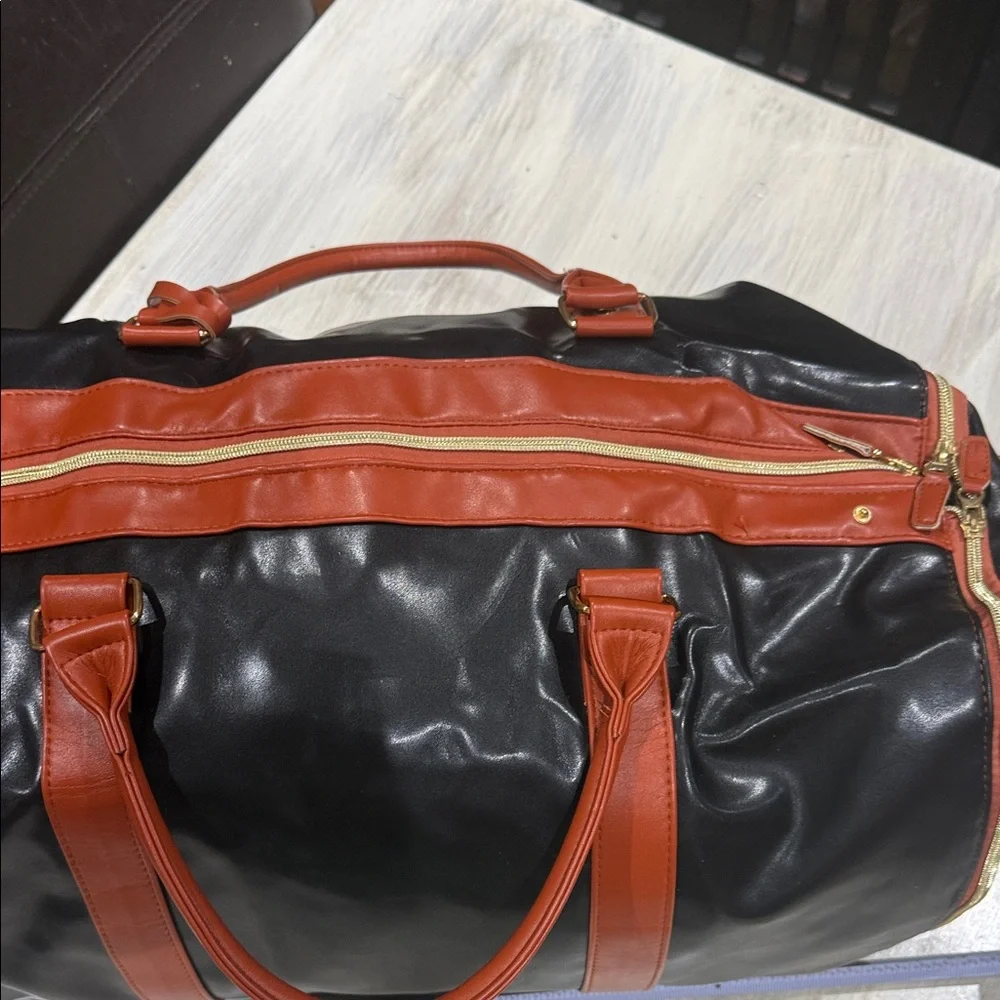 Elegant Retro Black and Tan Travel Duffle